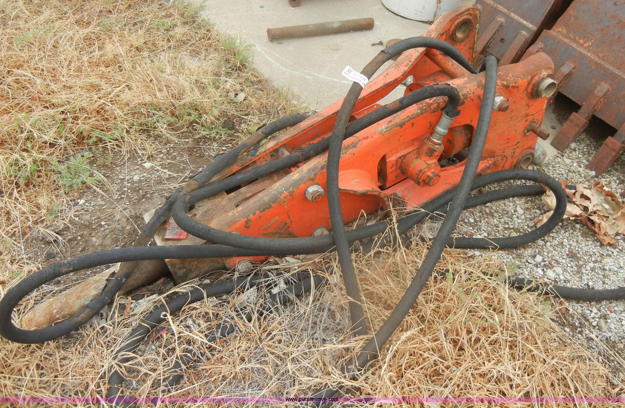 Backhoe breaker attachment in Burlingame, KS Item M9722 sold Purple