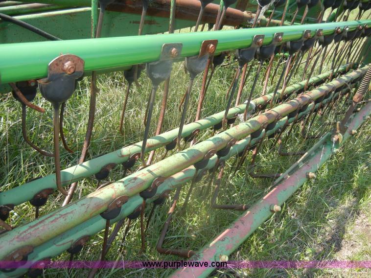 image for item D4637 John Deere 700 twin hydraulic basket rake