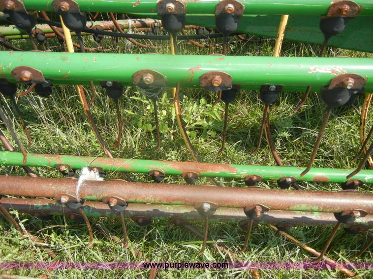 image for item D4637 John Deere 700 twin hydraulic basket rake