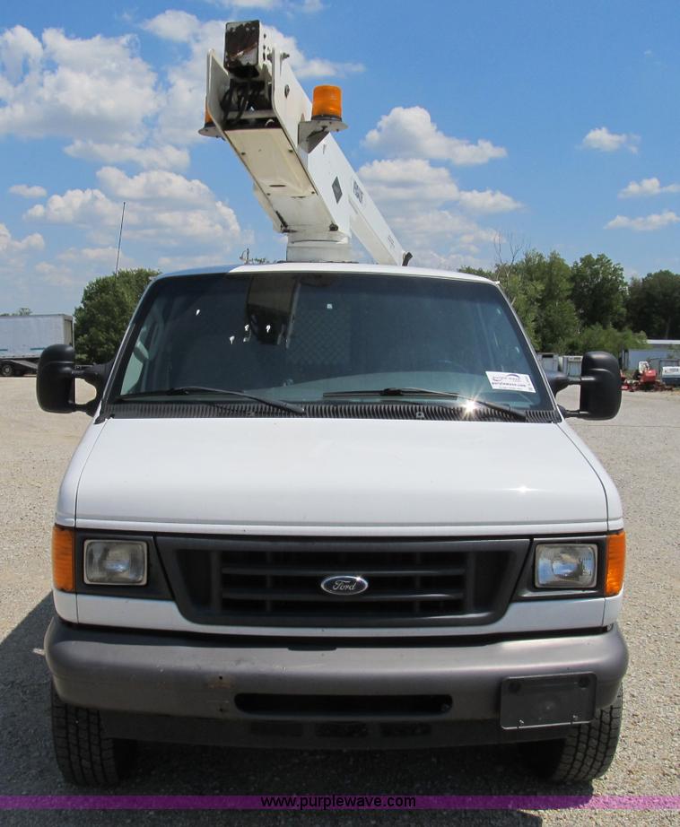 image for item B2830 2007 Ford E350 cargo van with bucket attachment