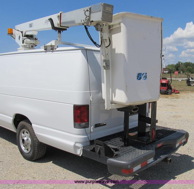 image for item B2830 2007 Ford E350 cargo van with bucket attachment