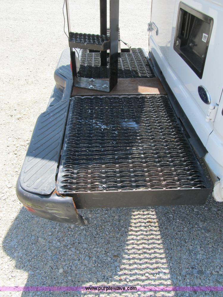 image for item B2830 2007 Ford E350 cargo van with bucket attachment