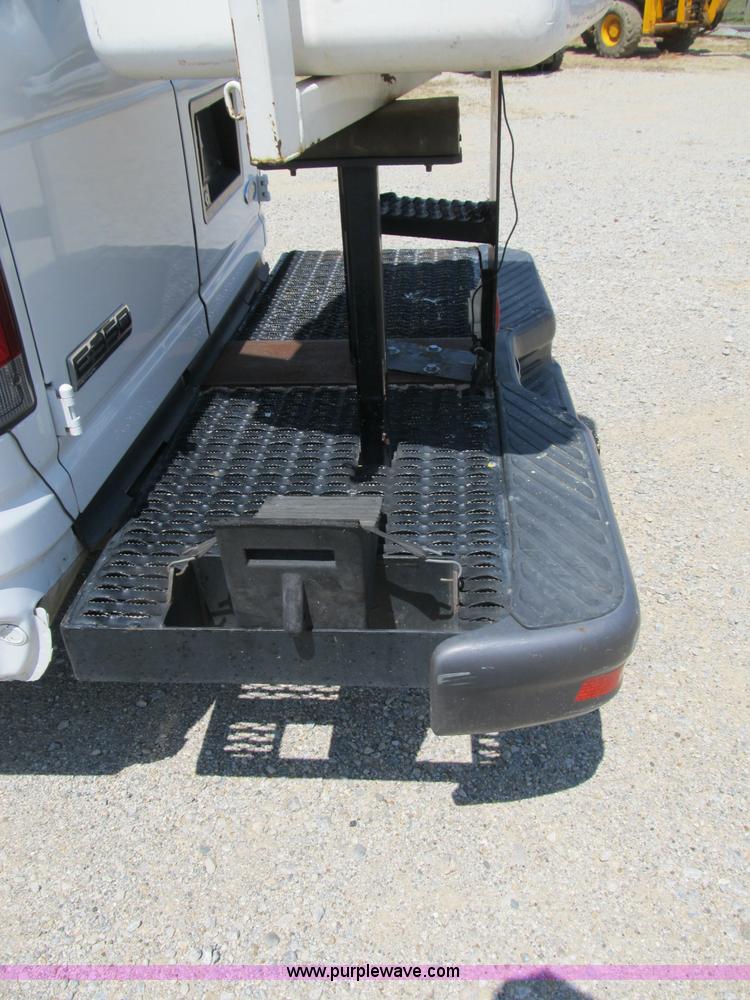 image for item B2830 2007 Ford E350 cargo van with bucket attachment