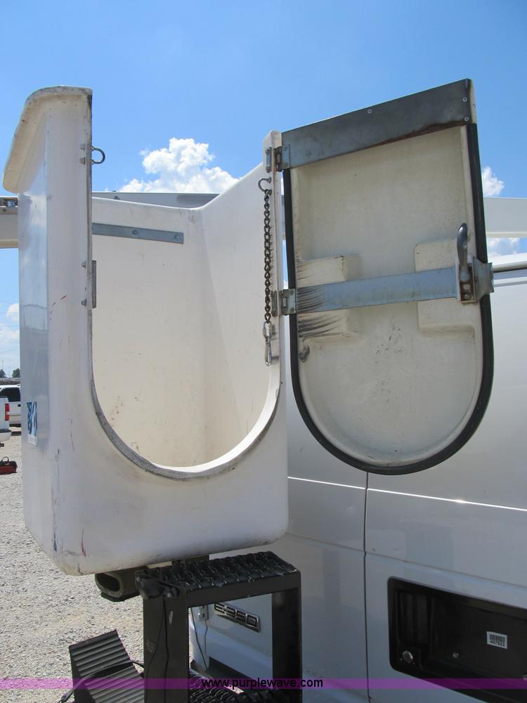 image for item B2830 2007 Ford E350 cargo van with bucket attachment