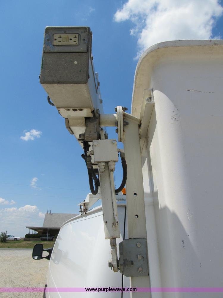 image for item B2830 2007 Ford E350 cargo van with bucket attachment