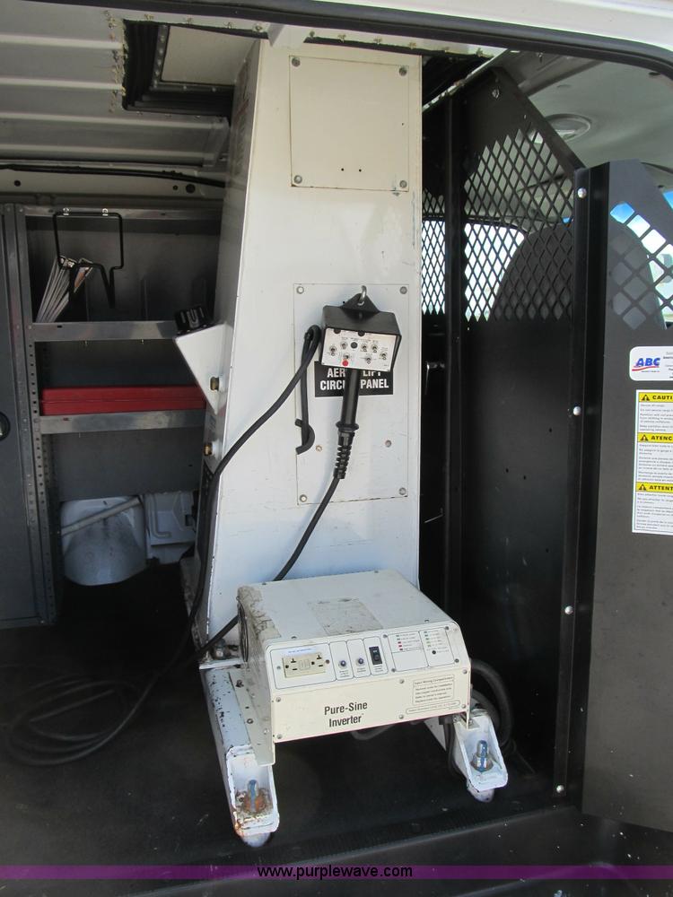 image for item B2830 2007 Ford E350 cargo van with bucket attachment