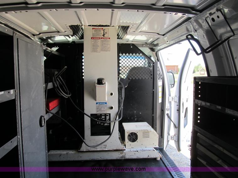image for item B2830 2007 Ford E350 cargo van with bucket attachment
