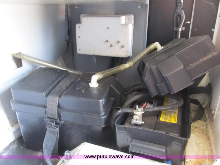 image for item B2830 2007 Ford E350 cargo van with bucket attachment