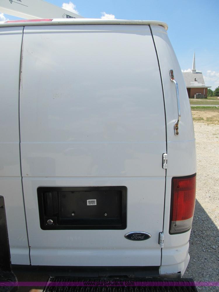 image for item B2830 2007 Ford E350 cargo van with bucket attachment