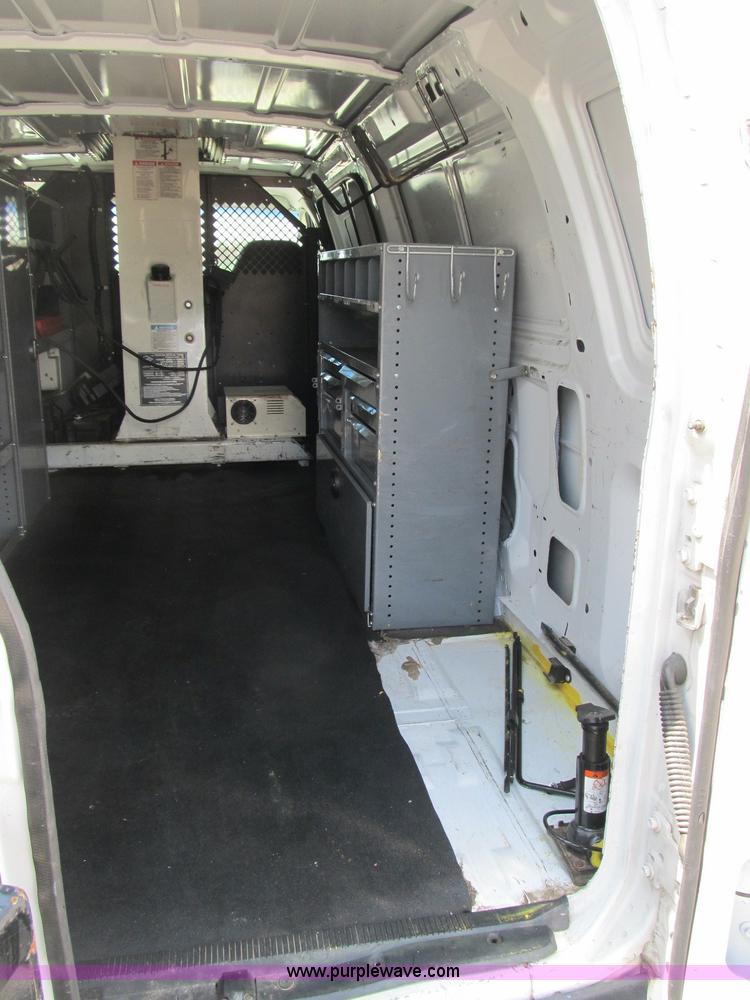 image for item B2830 2007 Ford E350 cargo van with bucket attachment