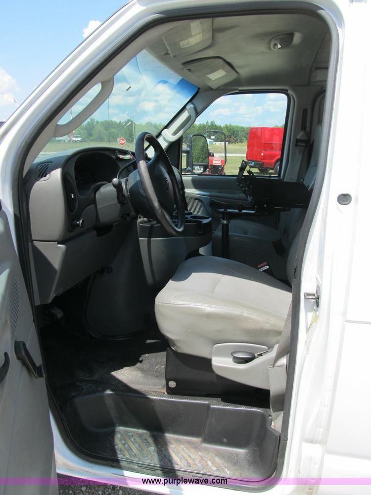 image for item B2830 2007 Ford E350 cargo van with bucket attachment