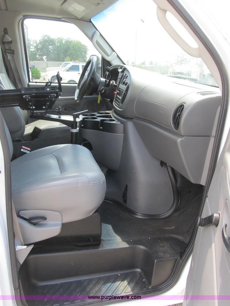 image for item B2830 2007 Ford E350 cargo van with bucket attachment