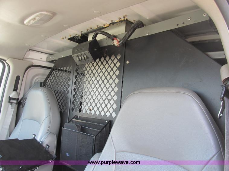 image for item B2830 2007 Ford E350 cargo van with bucket attachment