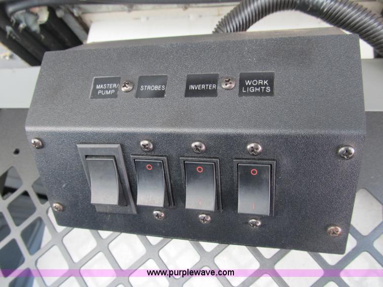 image for item B2830 2007 Ford E350 cargo van with bucket attachment