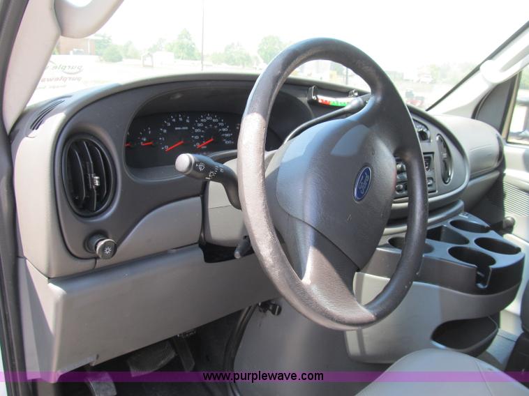 image for item B2830 2007 Ford E350 cargo van with bucket attachment