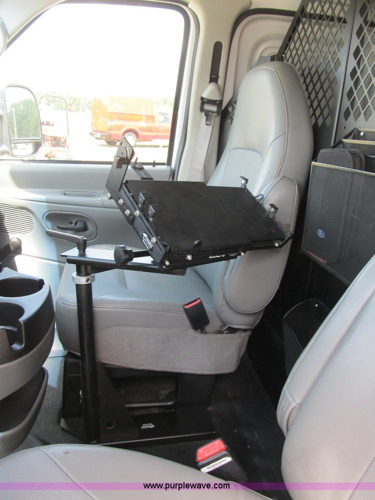 image for item B2830 2007 Ford E350 cargo van with bucket attachment