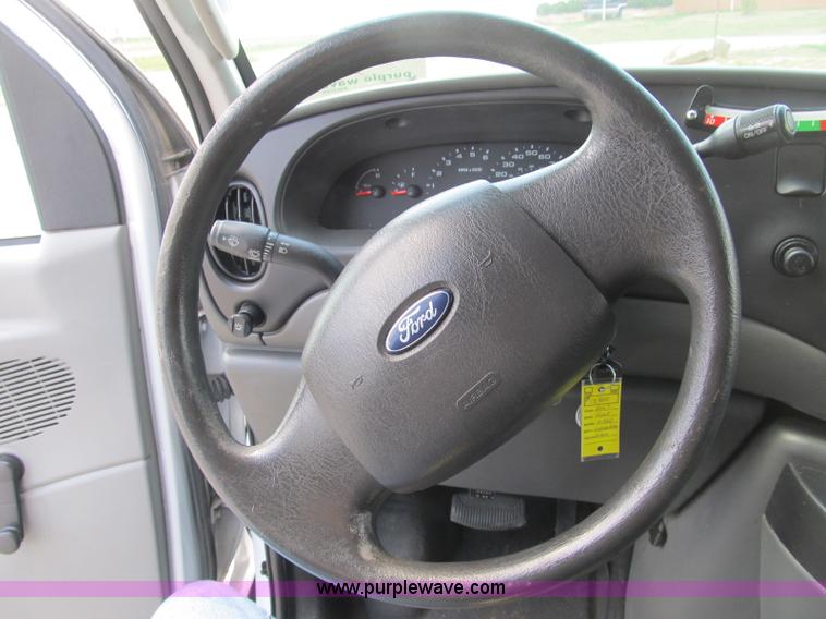 image for item B2830 2007 Ford E350 cargo van with bucket attachment