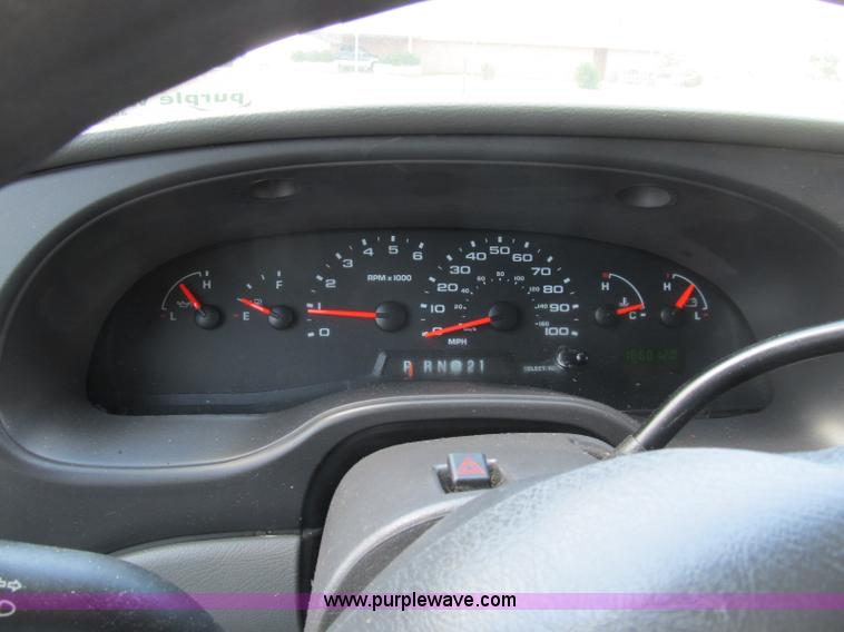 image for item B2830 2007 Ford E350 cargo van with bucket attachment