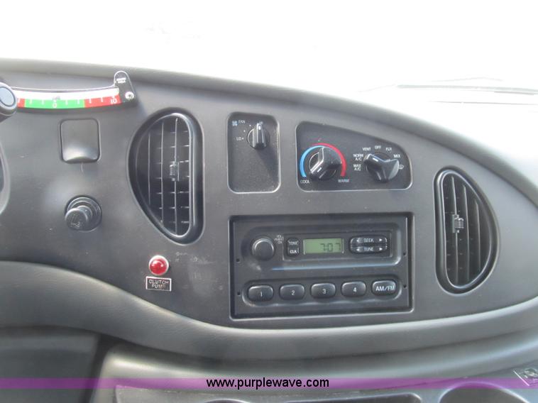 image for item B2830 2007 Ford E350 cargo van with bucket attachment