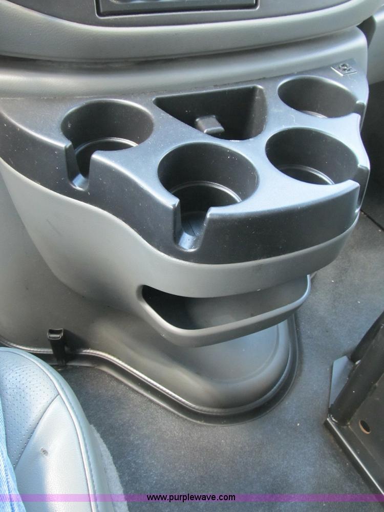 image for item B2830 2007 Ford E350 cargo van with bucket attachment