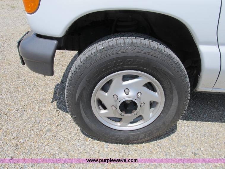 image for item B2830 2007 Ford E350 cargo van with bucket attachment