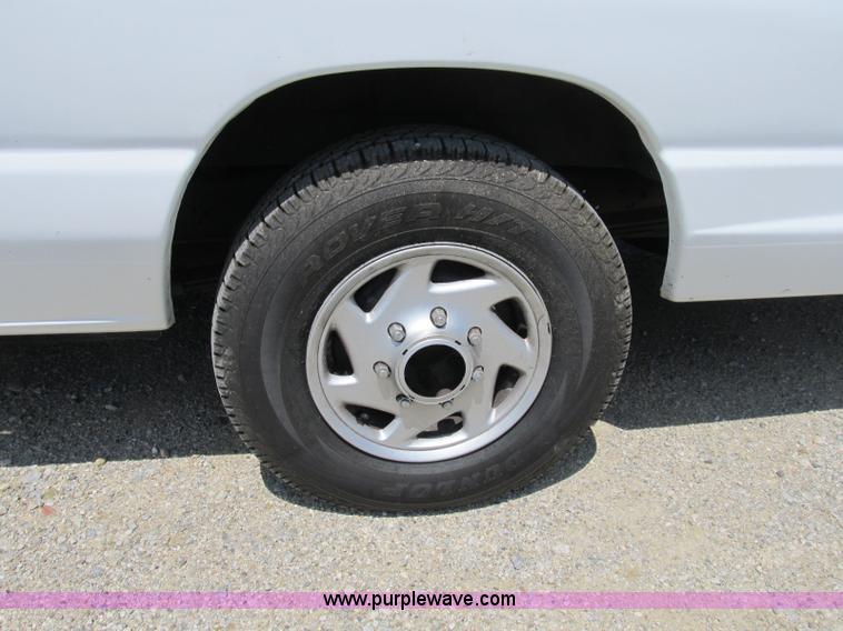 image for item B2830 2007 Ford E350 cargo van with bucket attachment