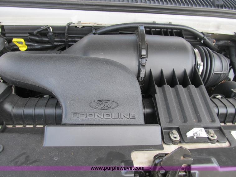image for item B2830 2007 Ford E350 cargo van with bucket attachment