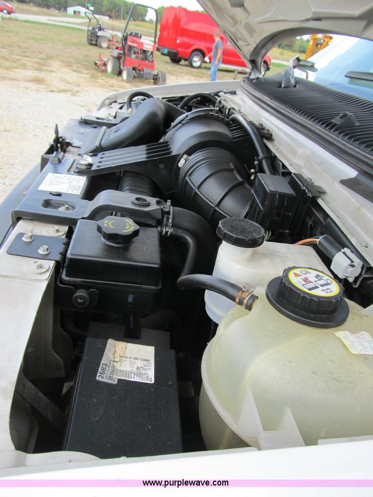 image for item B2830 2007 Ford E350 cargo van with bucket attachment