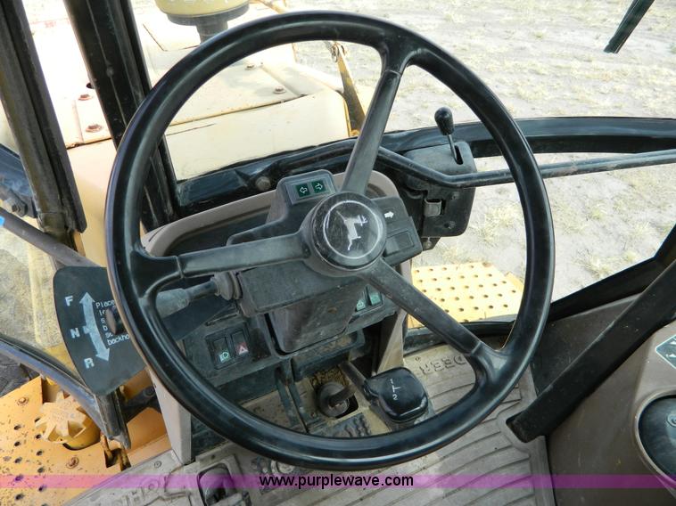 image for item B3841 1993 John Deere 310D backhoe
