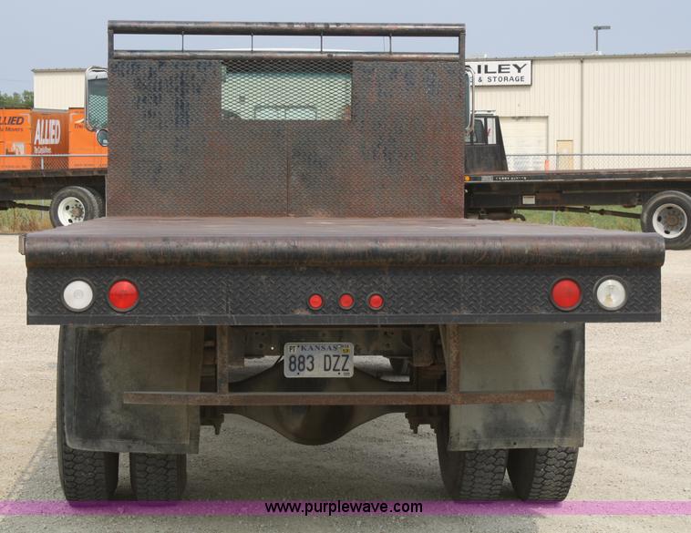 image for item B6960 1995 GMC TopKick flatbed dump truck