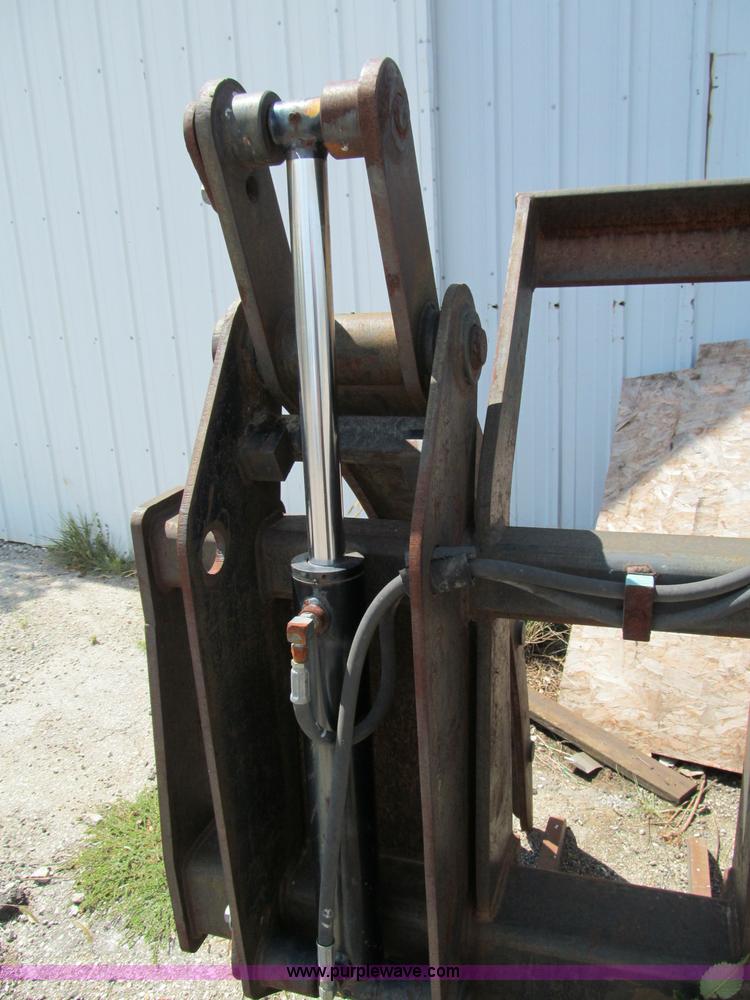 image for item E2068 Caterpillar 950 grapple bucket