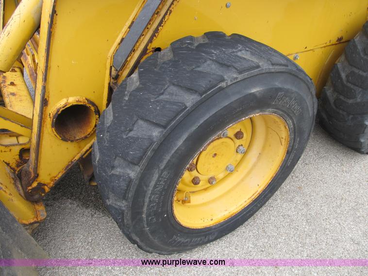 image for item B2861 2006 John Deere 317 skid steer