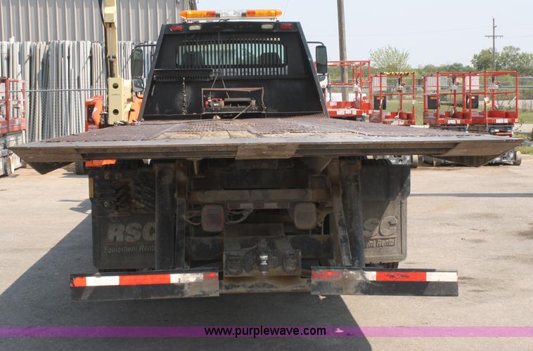 image for item B6876 2006 Freightliner Business Class M2 rollback truck