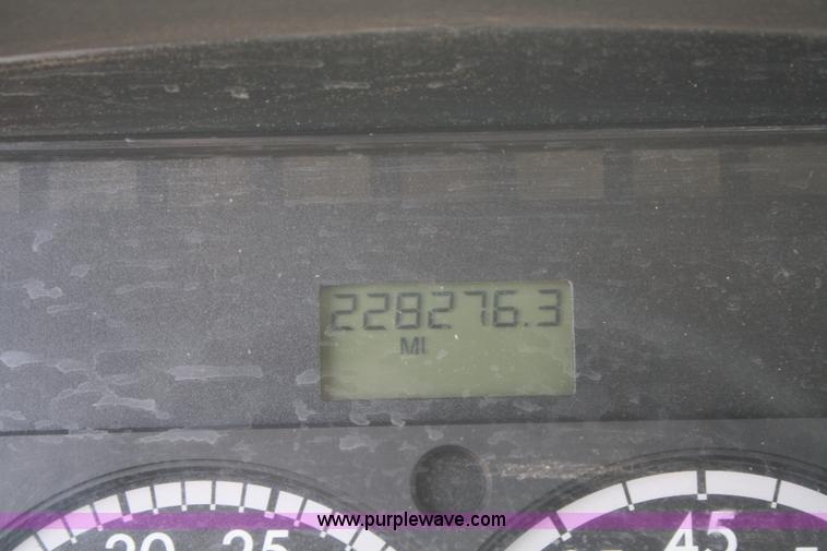 image for item B6876 2006 Freightliner Business Class M2 rollback truck