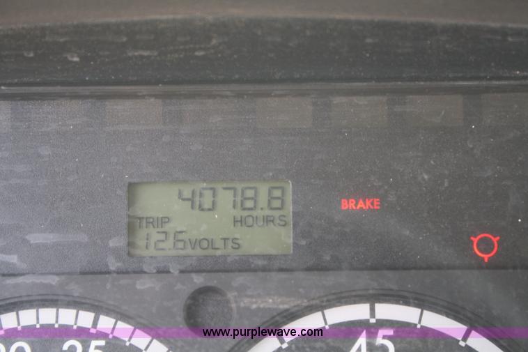 image for item B6876 2006 Freightliner Business Class M2 rollback truck