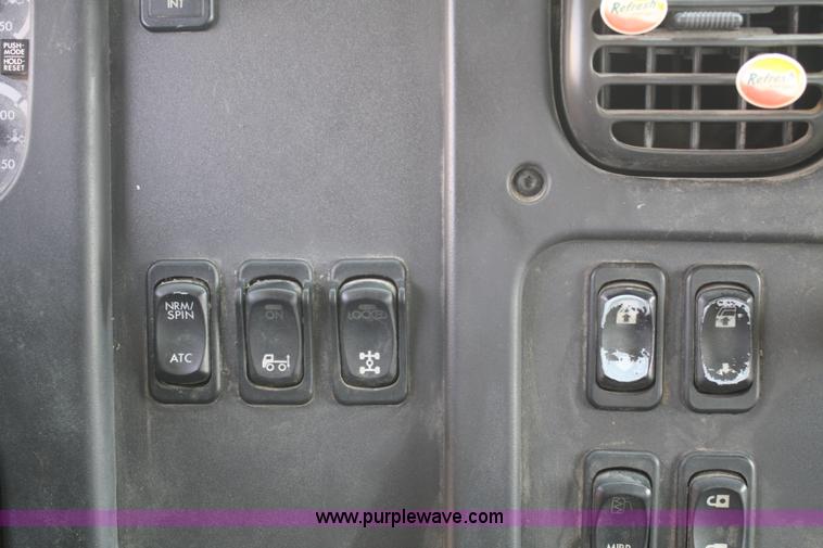 image for item B6876 2006 Freightliner Business Class M2 rollback truck