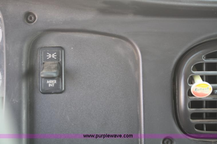 image for item B6876 2006 Freightliner Business Class M2 rollback truck