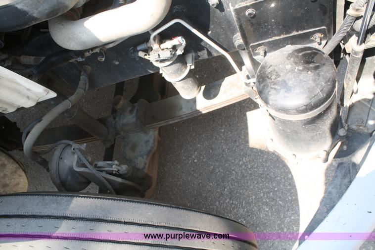 image for item B6876 2006 Freightliner Business Class M2 rollback truck