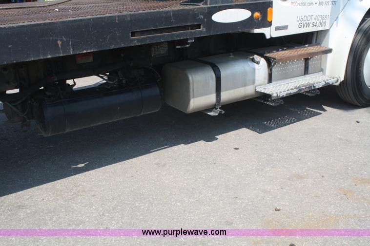 image for item B6876 2006 Freightliner Business Class M2 rollback truck