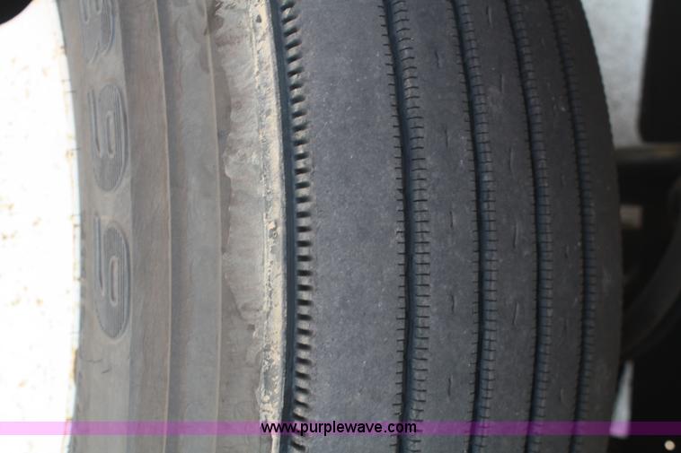 image for item B6876 2006 Freightliner Business Class M2 rollback truck