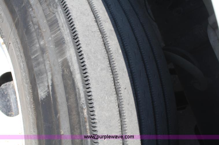 image for item B6876 2006 Freightliner Business Class M2 rollback truck