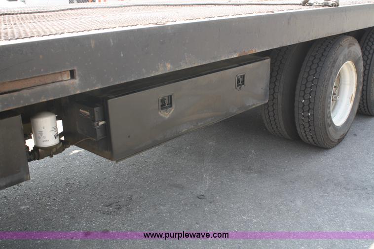 image for item B6876 2006 Freightliner Business Class M2 rollback truck