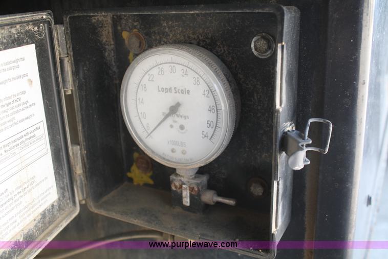 image for item B6876 2006 Freightliner Business Class M2 rollback truck