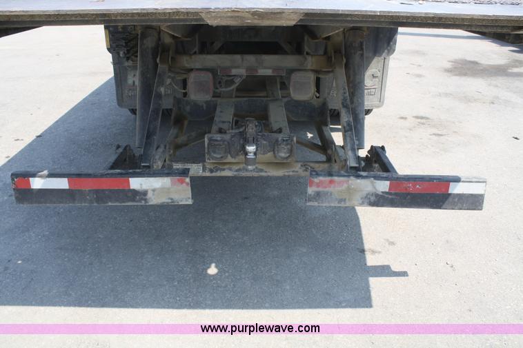 image for item B6876 2006 Freightliner Business Class M2 rollback truck