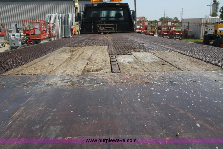 image for item B6876 2006 Freightliner Business Class M2 rollback truck