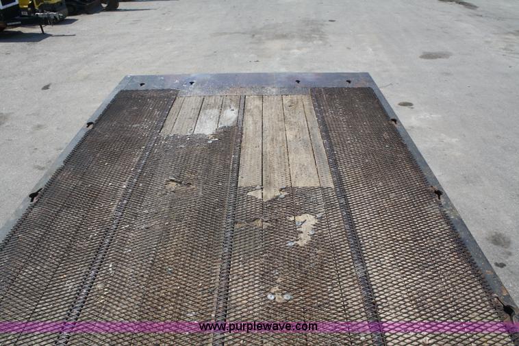 image for item B6876 2006 Freightliner Business Class M2 rollback truck