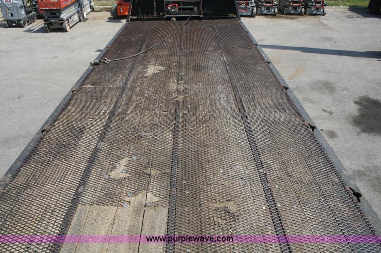 image for item B6876 2006 Freightliner Business Class M2 rollback truck