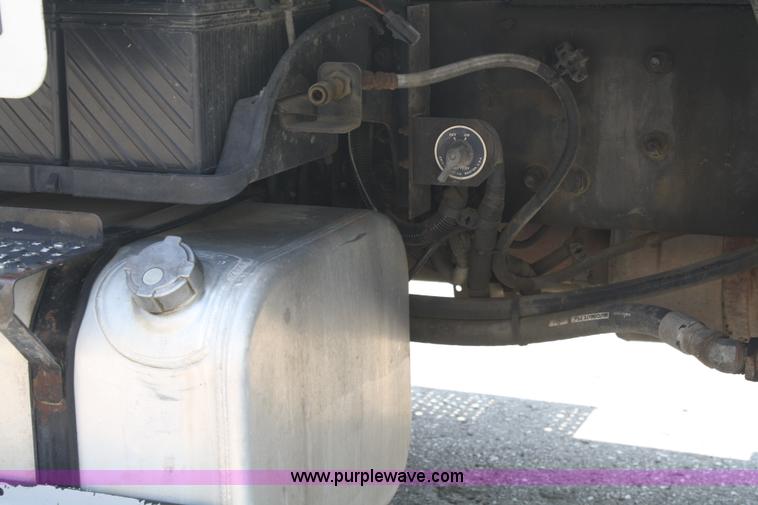 image for item B6876 2006 Freightliner Business Class M2 rollback truck