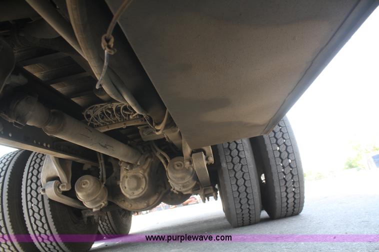 image for item B6876 2006 Freightliner Business Class M2 rollback truck