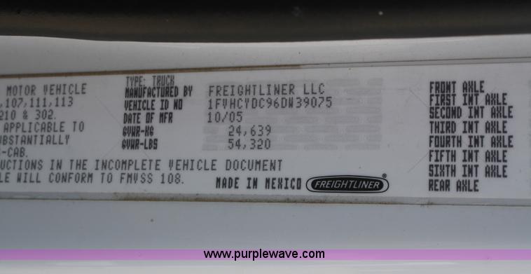 image for item B6876 2006 Freightliner Business Class M2 rollback truck